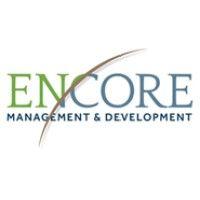 encore management & development logo image