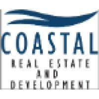 coastal real estate and development logo image