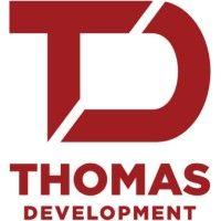 thomas development llc logo image