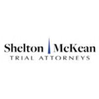 shelton | mckean - trial attorneys logo image