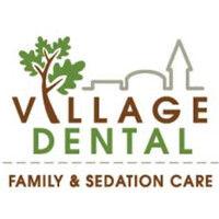 village dental family and sedation care logo image