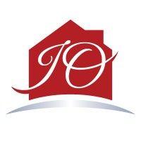 the janice overbeck real estate team logo image