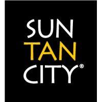 sun tan city logo image