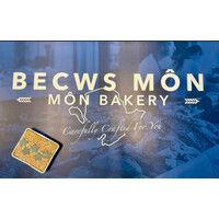 becws mon - mon bakery logo image