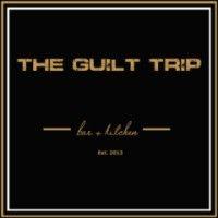 the guilt trip bar + kitchen logo image