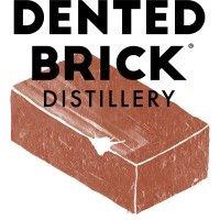 dented brick distillery logo image