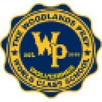 the woodlands preparatory school logo image