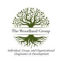 the woodland group, llc logo image