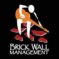 brick wall management logo image