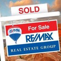 re/max real estate group colorado springs, co logo image