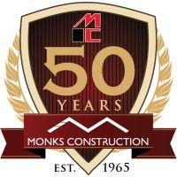 r.e. monks construction logo image