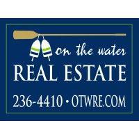 on the water real estate logo image